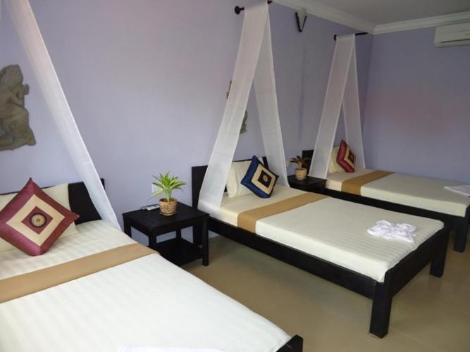 Ladybug Guesthouse Siem Reap Værelse billede